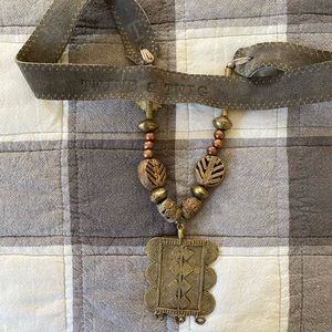 Twine and Twig leather necklace gold medallion